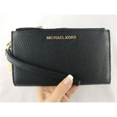 can the michael kors jet set phone wristlet|Jet Set Large Leather Smartphone Wristlet Wallet .